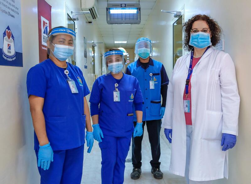 Abu Dhabi, United Arab Emirates, June 22, 2020.   
 (right) Dr. Margit Muller, Executive Director of the Abu Dhabi Falcon Hospital with her team of veterinarians.
Victor Besa  / The National
Section:  NA
Reporter:  Haneen Dajani