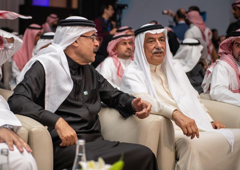 President and CEO of Saudi Aramco Amin Nasser peaking with former finance minister Ibrahim Abdulaziz Al Assaf. EPA