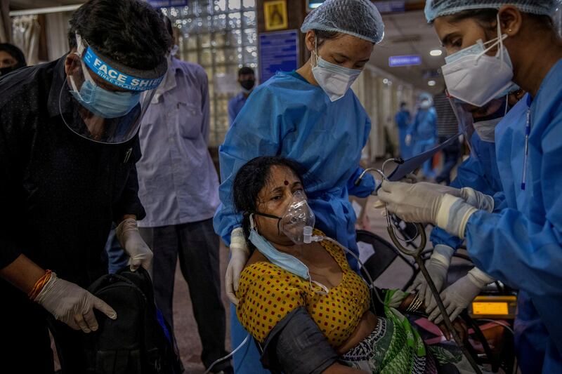 Siddiqui captures the horrors of Covid-19. Here, a female patient arrives at the Holy Family Hospital in New Delhi on April 29, 2021. Reuters