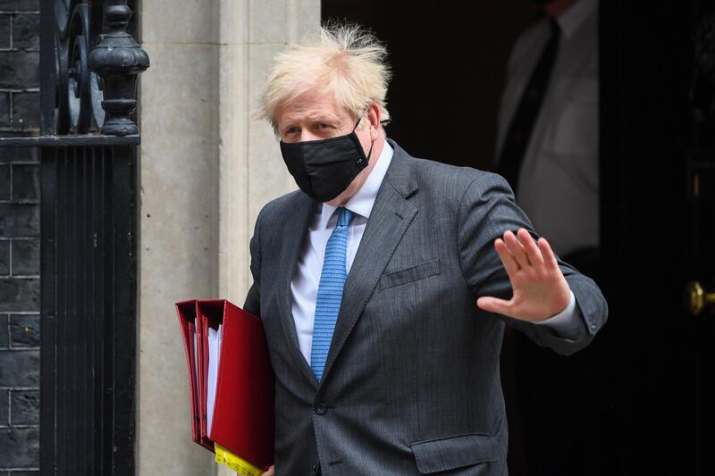 Boris Johnson, U.K. prime minister, departs from number 10 Downing Street on his way to Parliament in London, U.K., on Wednesday, April 28, 2021. Johnson may be mired in allegations of sleaze and cronyism in his U.K. government, yet members of his ruling Conservative Party say voters remain unmoved by the furor ahead of key elections next week. Photographer: Chris J. Ratcliffe/Bloomberg
