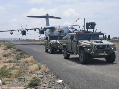 A Spanish military plane and military vehicles depart as Spanish diplomatic personnel and citizens are evacuated. Reuters 