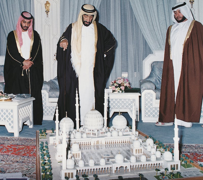 Abu Dhabi, UAE. Sheikh Zayed bin Sultan al Nahyan, centre, inspecting the plan of the Sheikh Zayed Mosque with his sons Sheikh Hamdan, left, and Sheikh Sultan, right.

Courtesy Al Itihad.