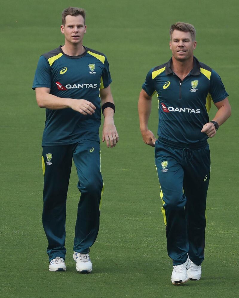 Australia's Steve Smith, left, along with David Warner attend a training session ahead of their first one-day international cricket match against India in Mumbai, India, Saturday, Jan. 11, 2020. (AP Photo/Rafiq Maqbool)