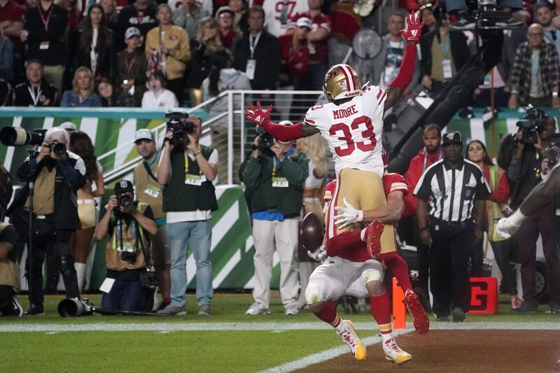 San Francisco 49ers' Tarvarius Moore intercepts the ball thrown to Chiefs' Travis Kelce.  AFP