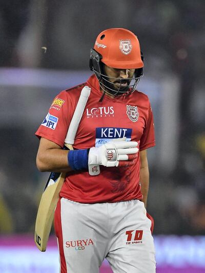 Kings XI Punjab cricketer Yuvraj Singh walks back to pavilion after his dismissal during the 2018 Indian Premier League (IPL) Twenty20 cricket match between Kings XI Punjab and Chennai Super Kings at the Punjab Cricket Association Stadium in Mohali on April 15, 2018. / AFP PHOTO / PRAKASH SINGH / ----IMAGE RESTRICTED TO EDITORIAL USE - STRICTLY NO COMMERCIAL USE----- / GETTYOUT