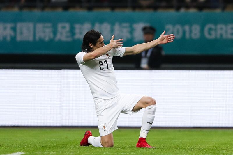 Football Soccer - Wales v Uruguay - China Cup Finals - Guangxi Sports Center, Nanning, China - March 26, 2018. Edinson Cavani of Uruguay celebrates scoring a goal. REUTERS/Stringer ATTENTION EDITORS - THIS IMAGE WAS PROVIDED BY A THIRD PARTY.  CHINA OUT. NO COMMERCIAL OR EDITORIAL SALES IN CHINA.