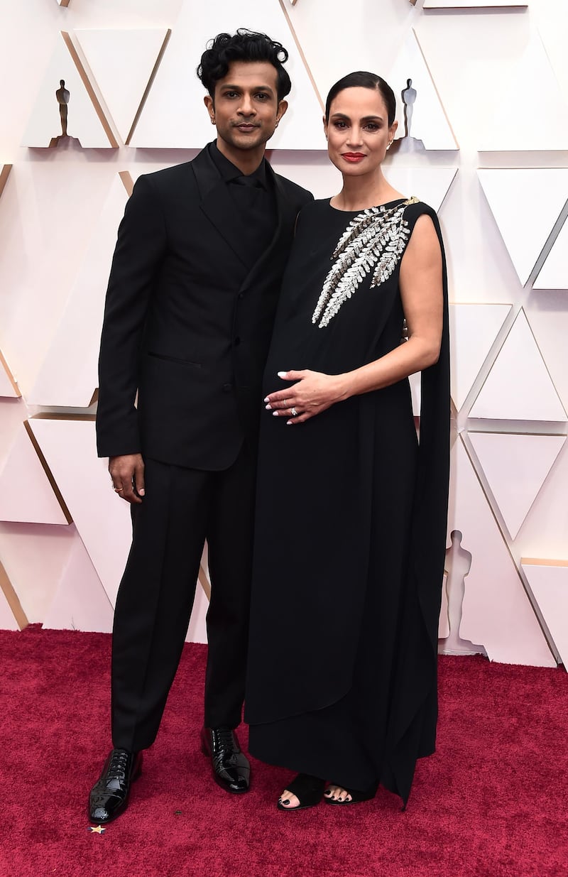 Utkarsh Ambudkar and Naomi Campbell arrive at the Oscars on Sunday, February 9, 2020, at the Dolby Theatre in Los Angeles. AP