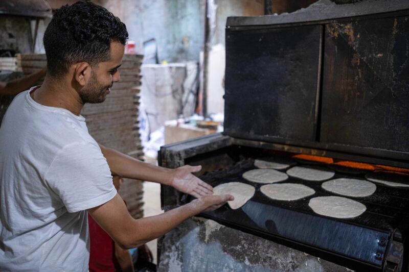 A baker at the Al Mgharblin food market in Cairo. Annual inflation in Egypt hit 38 per cent in September, marking the fourth consecutive month of record-high inflation numbers. Bloomberg