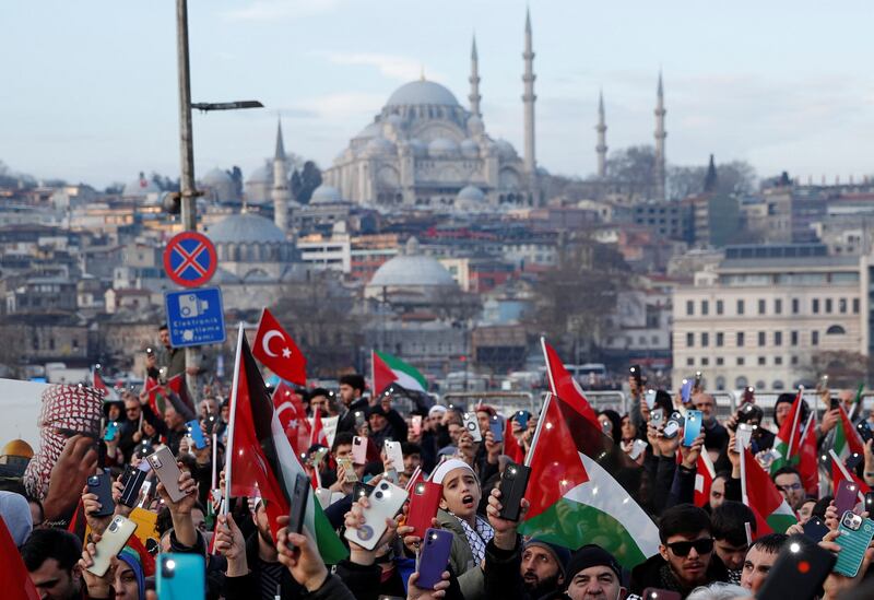 People gather over the Galata Bridge in solidarity with Palestinian New Year's Day in Istanbul. Reuters