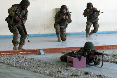 Afghan National Army (ANA) soldiers take part in a training exercise at the Kabul Military Training Centre (KMTC) in Kabul, Afghanistan January 27, 2019. REUTERS/Omar Sobhani