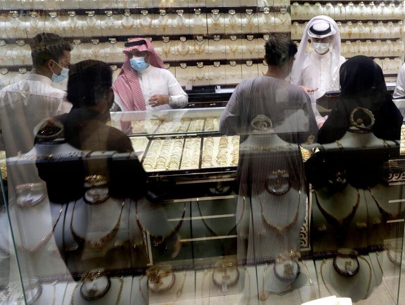 Saudis buy jewels at the gold market a day before the expected increase of VAT from 5% to 15%, in Jiddah, Saudi Arabia. AP Photo