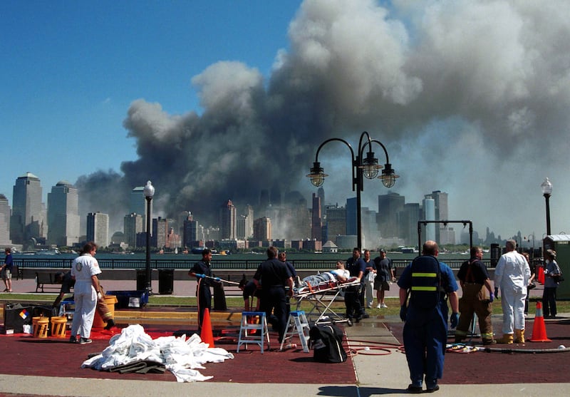 Emergency personnel tend to injured people in Liberty Park, New Jersey, as the enormity of the day's events slowly begin to hit home. Reuters