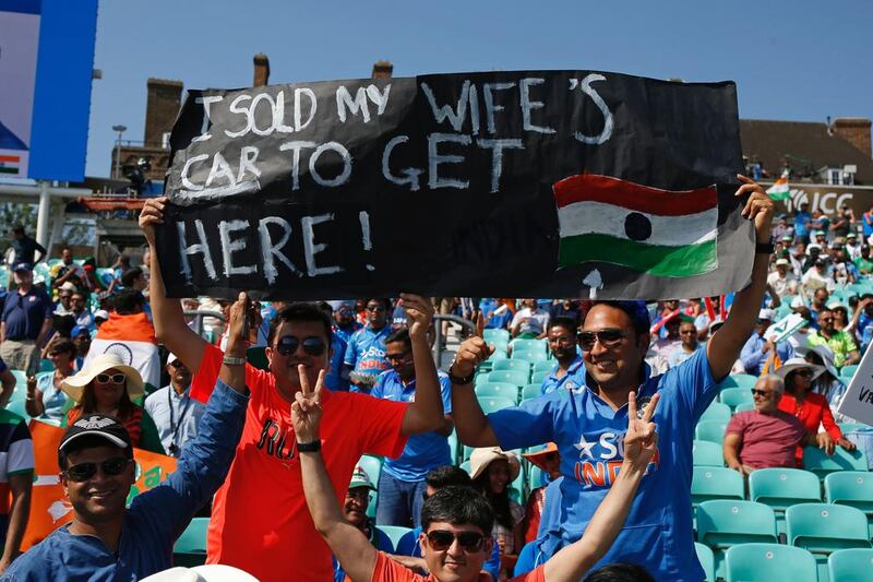 An Indian supporter holds up a banner in the crowd ahead of the Champions Trophy final India and Pakistan at The Oval in London. AFP