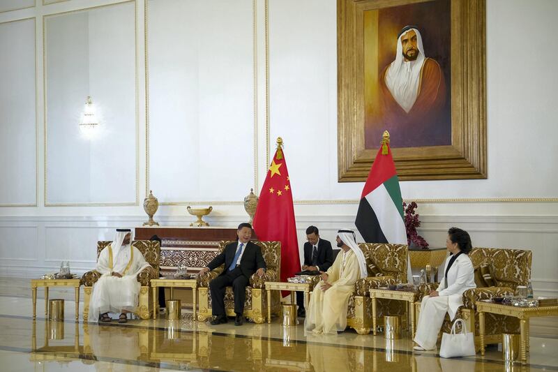 ABU DHABI, UNITED ARAB EMIRATES - July 19, 2018: HH Sheikh Mohamed bin Rashid Al Maktoum, Vice-President, Prime Minister of the UAE, Ruler of Dubai and Minister of Defence (2nd R), and HH Sheikh Mohamed bin Zayed Al Nahyan Crown Prince of Abu Dhabi Deputy Supreme Commander of the UAE Armed Forces (L) receive HE Xi Jinping, President of China (3rd R), at the Presidential Airport. Seen with Peng Liyuan, First Lady of China (R).

( Saif Al Muhairi / Government of Dubai Media Office )
---