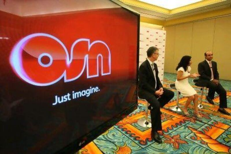 David Butorac, left, the chief executive of OSN, said the global media industry loses "billions" to piracy, Pawan Singh / The National