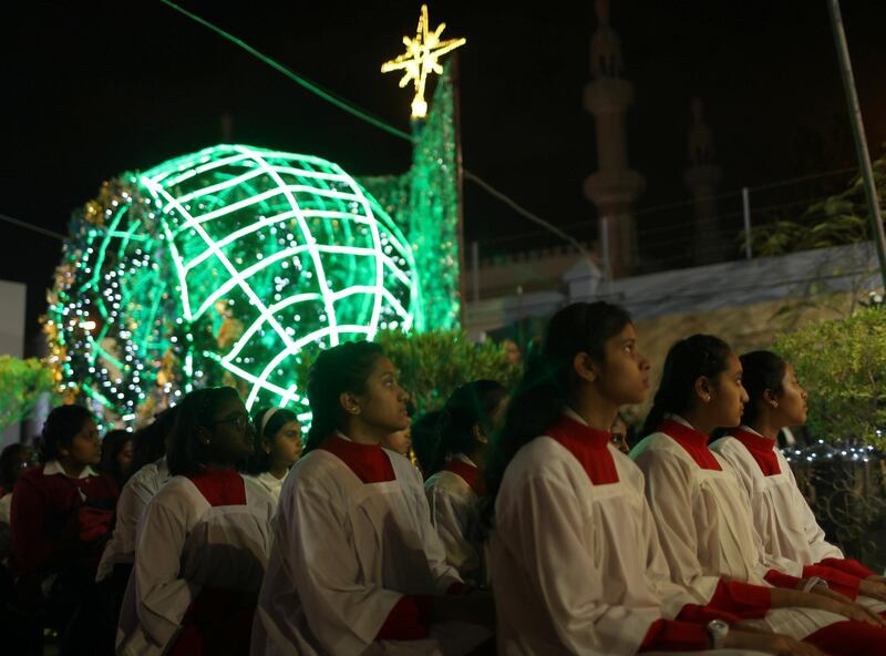 Members of the Christian expatriate community attend a mass on Christmas Eve at Santa Maria Church in Dubai, United Arab Emirates. Reuters