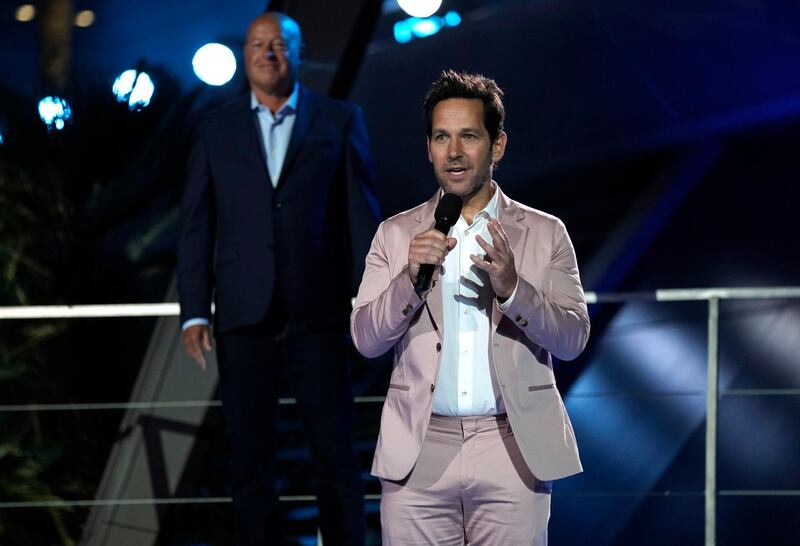 Paul Rudd speaks as Disney chief executive Bob Chapek looks on at the Avengers Campus dedication ceremony at Disney's California Adventure Park on June 2, 2021. AP