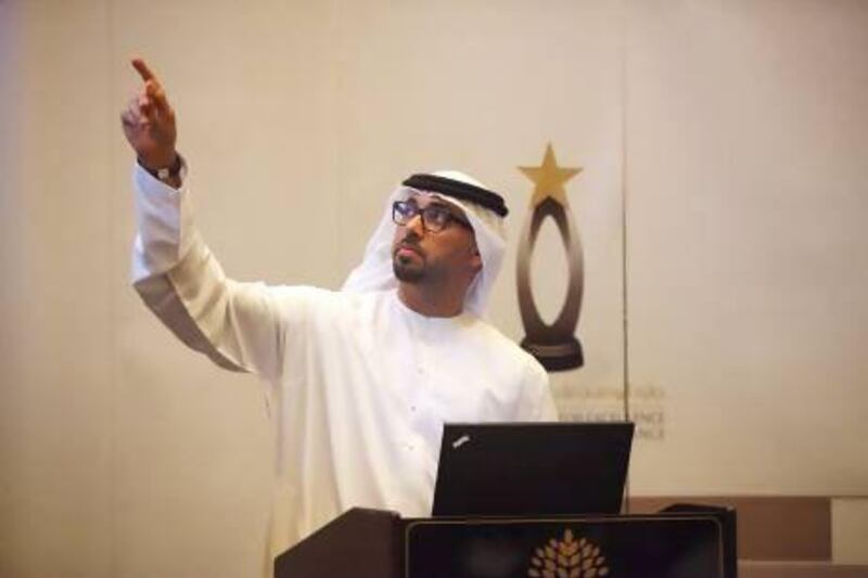 The head of the Abu Dhabi Excellence Award, Yasser Al Naqbi, announces the new categories yesterday. Fatima Al Marzooqi / The National