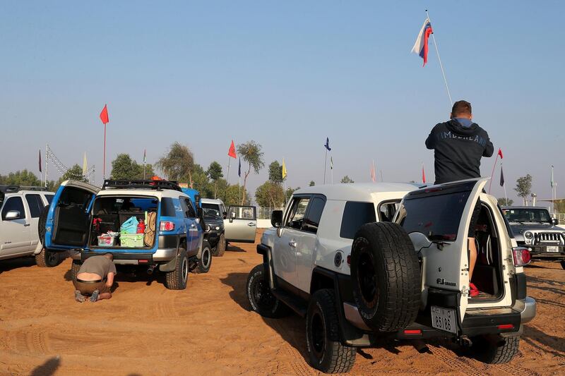 SHARJAH, UNITED ARAB EMIRATES , January 16– 2021 :- Members of the off roaders club getting ready before the start of desert clean up drive at the Al Badayer desert area in Sharjah. (Pawan Singh / The National) For News/Stock/Online/Instagram/Standalone/Big Picture. Story by Nick Webster