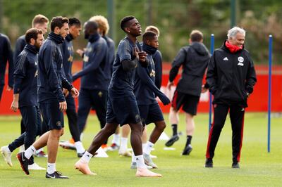 Soccer Football - Champions League - Manchester United Training - Aon Training Complex, Manchester, Britain - October 1, 2018   Manchester United manager Jose Mourinho and Paul Pogba during trainng   Action Images via Reuters/Jason Cairnduff