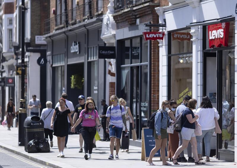 Shoppers in Covent Garden in London, U.K., on Saturday, June 5, 2021. Carnaby Street is the heart of British fashion, home to the Rolling Stones’ flagship store, hip brands such as Dr. Martens shoes, and the Liberty London department store with its vast selection of classic designs. Photographer: Jason Alden/Bloomberg