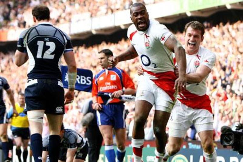 Ugo Monye, centre, celebrates his opening try in England’s 26-12 win at home to Scotland in 2009.