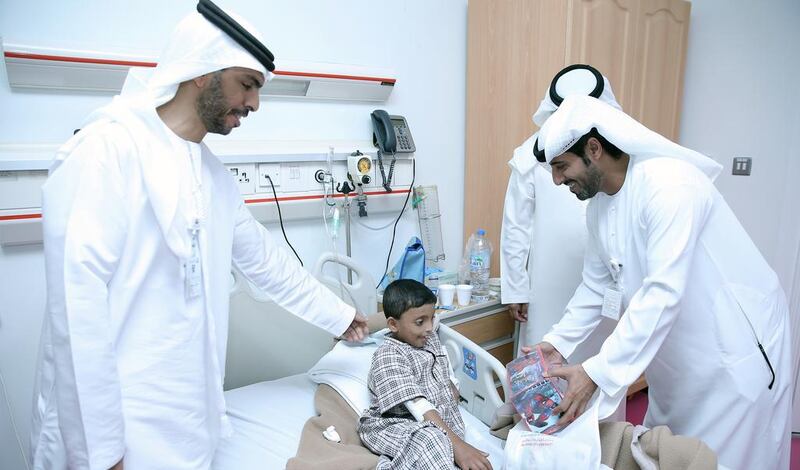 A delegation from the Abu Dhabi City Municipality visited Rahba Hospital to meet bed-ridden children and cheer them up by offering them gifts. Courtesy Abu Dhabi City Municipality