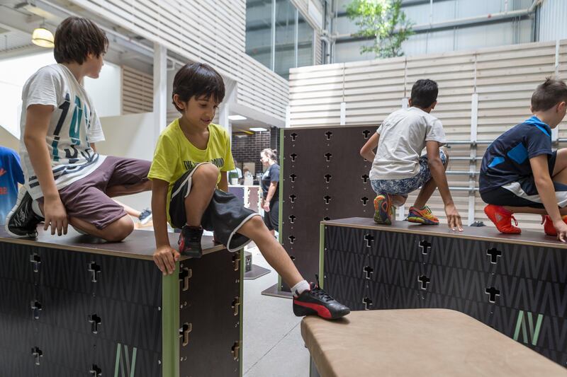 DUBAI, UNITED ARAB EMIRATES, 02 JULY 2017. Summer camps in the UAE. Children developing physical and technical skills in activities such as climbing, hanging, jumping, rolling, swinging and vaulting at a beginners class at Parkour DXB. "Parkour is one of the most holistic activities one can partake in, many different skills are developed," Barry Haggis, head coach at Parkour DXB, " We also coach conceptual skills such as overcoming fear, risk assessment, problem solving and teamwork." (Photo: Antonie Robertson/The National) Journalist: Ruba Haza. Section: National.