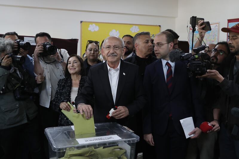Mr Kilicdaroglu votes in Ankara. Getty
