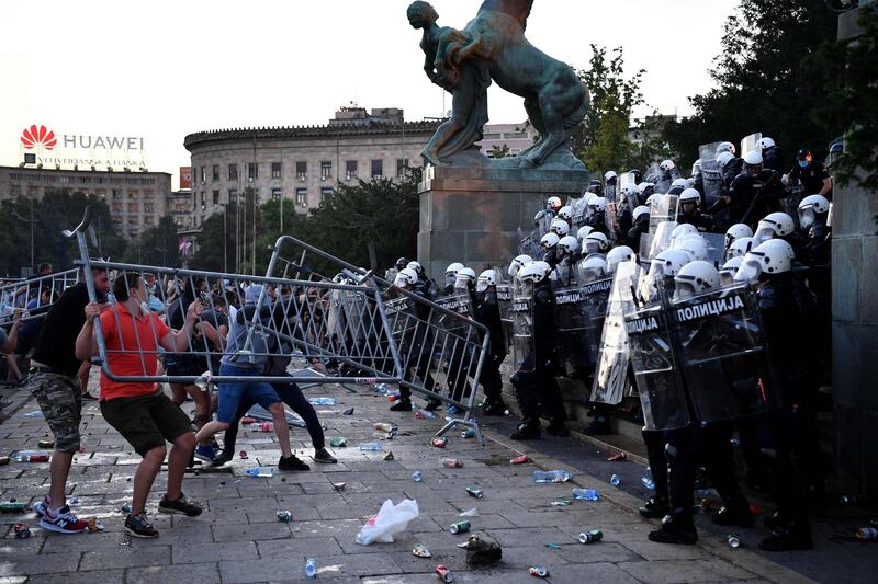 Protestors face police in Belgrade as clashes erupt over a weekend curfew announced to combat a resurgence of Covid-19 infections, despite Serbia's President Aleksandar Vucic saying that the weekend curfew is likely to be scrapped. AFP