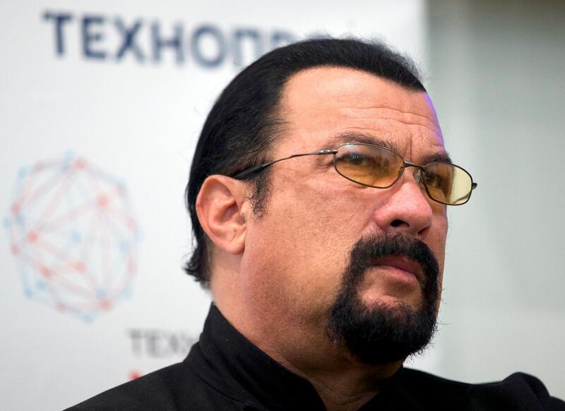 FILE - In this Sept. 22, 2015, file photo, actor Steven Seagal speaks at a news conference, while attending an opening ceremony for a research and development center in Moscow, Russia. Russia has appointed action movie star Steven Seagal as a special envoy for humanitarian ties with the United States. The Foreign Ministry announced the move on Saturday, Aug. 4, 2018 on its Facebook page, saying Seagalâ€™s portfolio in the unpaid position would be to â€œfacilitate relations between Russia and the United States in the humanitarian field, including cooperation in culture, arts, public and youth exchanges.â€ (AP Photo/Ivan Sekretarev, File)