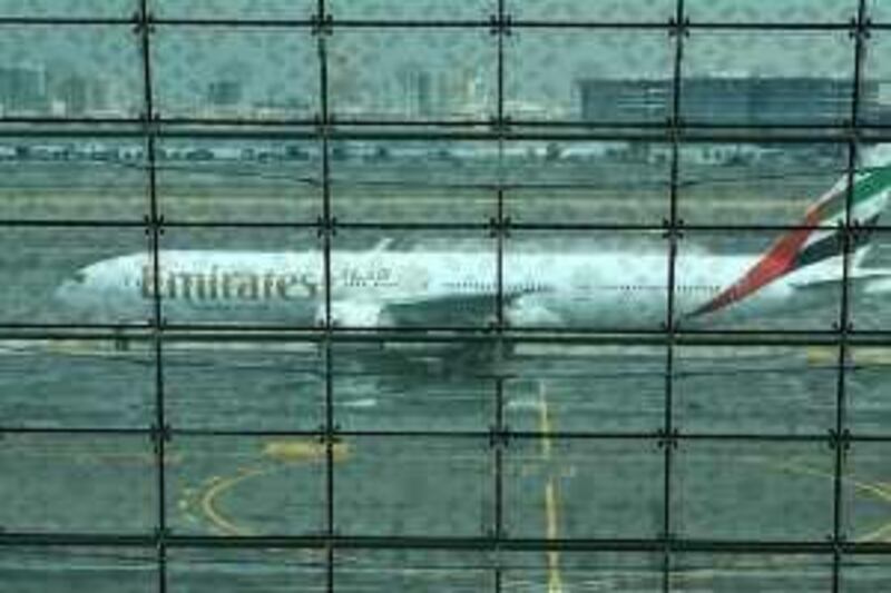 DUBAI, UNITED ARAB EMIRATES – Jan 15: Emirates Aeroplane at Dubai International Airport Terminal 3 in Dubai. (Pawan Singh / The National) *** Local Caption ***  PS35- DUBAI AIRPORT T3.jpg