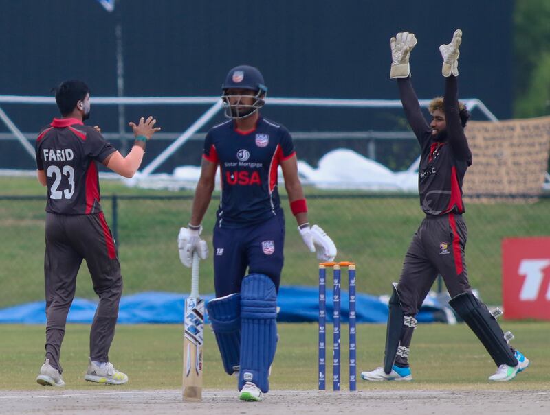 Zawar Farid and Vriitya Aravind celebrate after dismissing the United States captain Monank Patel in Cricket World Cup League 2 in Texas. Courtesy USA Cricket. Photo: USA Cricket