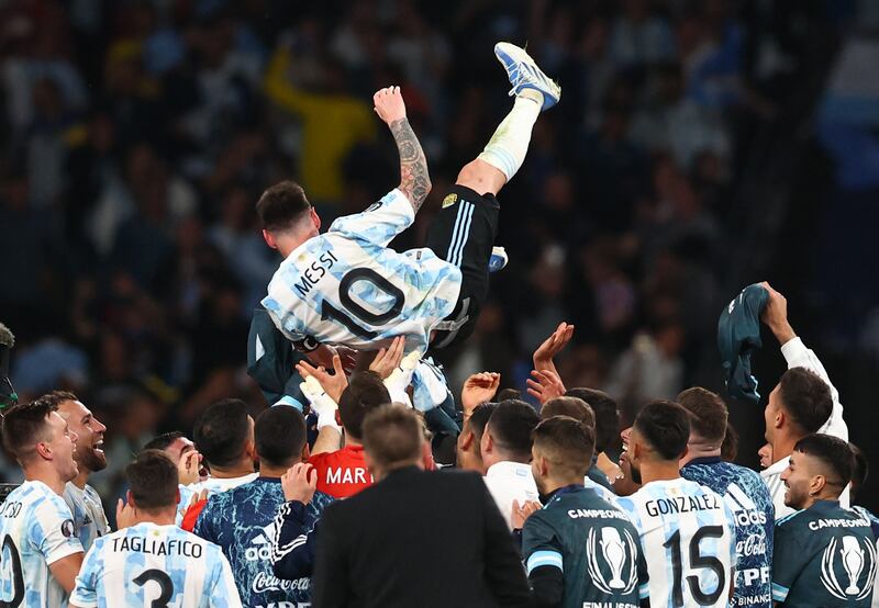 Argentina's Lionel Messi celebrates with teammates after winning the Finalissima. Reuters