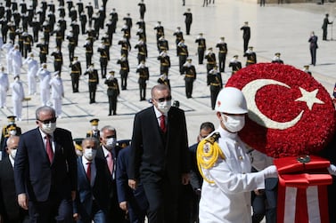 Turkey's President Recep Erdogan follows a military honour guard during a ceremony at the mausoleum of Mustafa Kemal Ataturk, founder of modern Turkey, in Ankara. AP