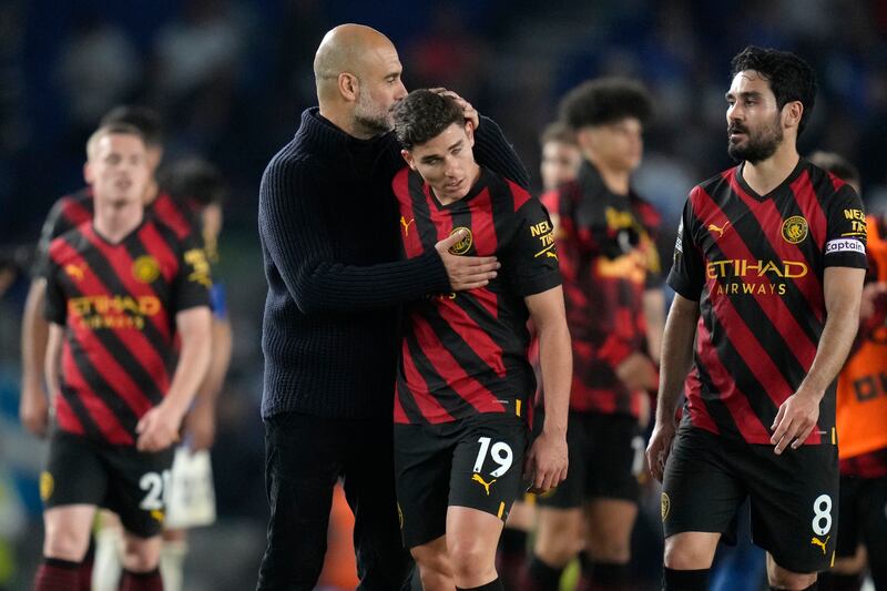 Pep Guardiola with Julian Alvarez after Manchester City's Premier League draw against Brighton. AP