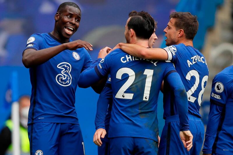 Chelsea's Kurt Zouma, left, celebrates after scoring. AFP