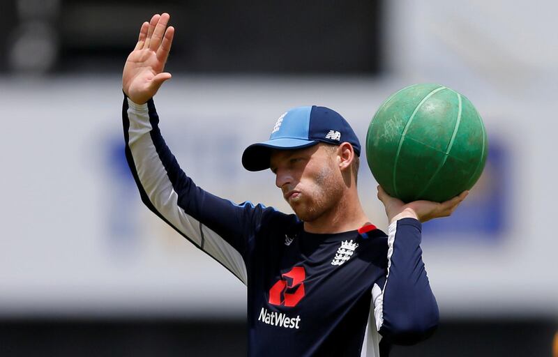 Cricket - Sri Lanka vs England - England Practice Session - Dambulla, Sri Lanka - October 8, 2018. England's Jos Buttler gestures at England team's dressing room during a practice session ahead of their first One Day International cricket match with Sri Lanka. REUTERS/Dinuka Liyanawatte