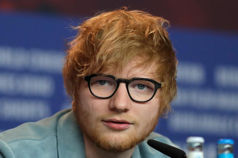 FILE - In this Friday, Feb. 23, 2018 file photo, singer-songwriter Ed Sheeran speaks during a press conference for the film 'Songwriter' during the 68th edition of the International Film Festival Berlin, Berlinale, in Berlin. Ed Sheeran has confirmed for the first time that he and long-time girlfriend Cherry Seaborn are married. British media have reported that the pair wed before Christmas in front of about 40 friends and family. In an interview, Sheeran talked about how he wrote the song â€œRemember the Name,â€ which refers to â€œmy wife,â€ before getting married. (AP Photo/Markus Schreiber, FILE)