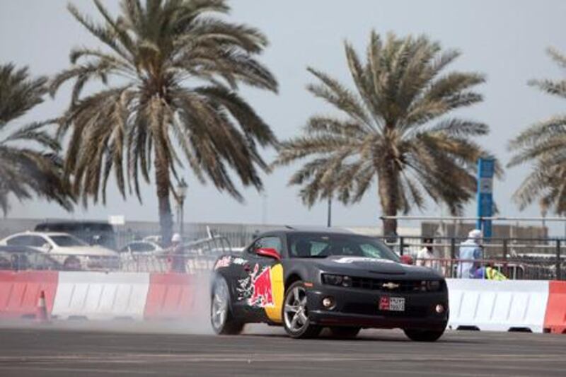 United Arab Emirates, Abu Dhabi, Feb. 16, 2012:  Abdo Feghali, a Lebanese rally driver and 'drifter' shows off his driving skills to the media in a Red Bull Car Park Drift competition preview on the Corniche in Abu Dhabi. (Silvia Razgova/The National)
