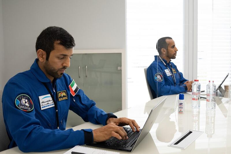 The UAE is a step closer to having two new astronauts. Five out of 14 remaining candidates are women. The search is in its final phase and the shortlisted candidates must pass the intense interview round. Here, Dr Sultan Al Neyadi, left, and Maj Hazza Al Mansouri are pictured taking part in in the interview panel. Courtesy: MBRSC