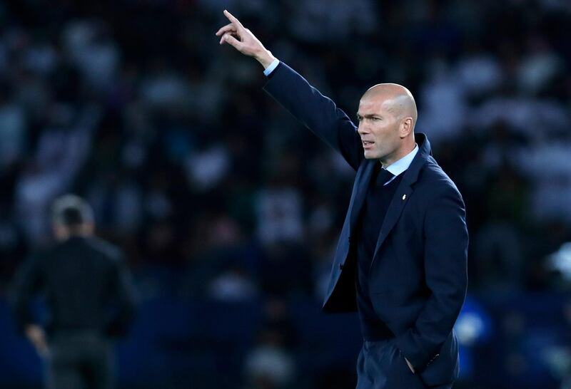Real Madrid head coach Zinedine Zidane hands out some instructions to his side. Hassan Ammar / AP Photo