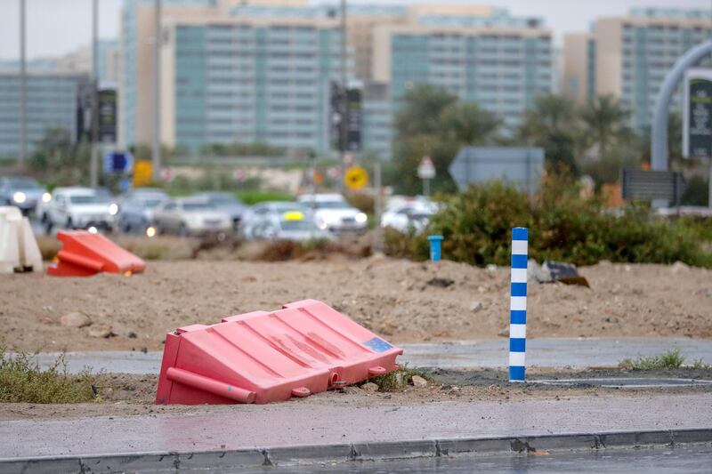 Abu Dhabi, United Arab Emirates, March 28, 2019.  ---  AUH weather.  Khalifa City.  Toppled over road divider due to strong winds.
Victor Besa/The National
Section:  NA
Reporter: