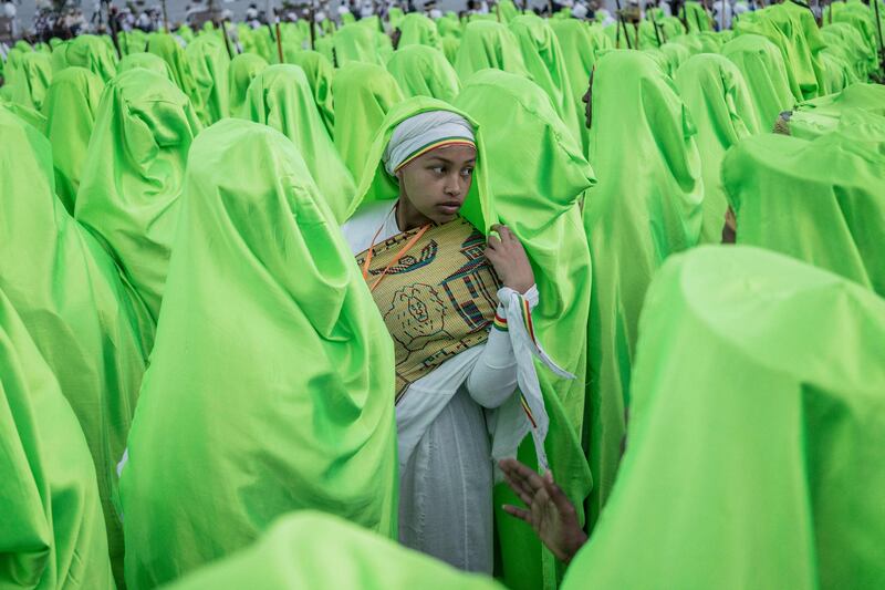 An Orthodox choir parade during the celebrations on the eve of the Ethiopian Orthodox holiday of Meskel, in Addis Ababa.   It commemorates the supposed discovery of the True Cross upon which Jesus was crucified. AFP