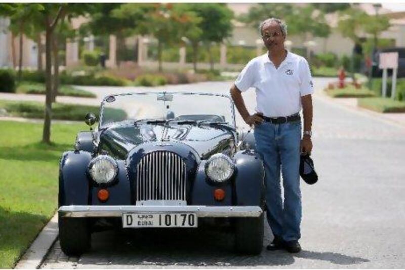 Car enthusiast Vijay Pillai says his Morgan Plus 4 , which he bought from a friend, turns heads whenever he drives it. Pawan Singh / The National