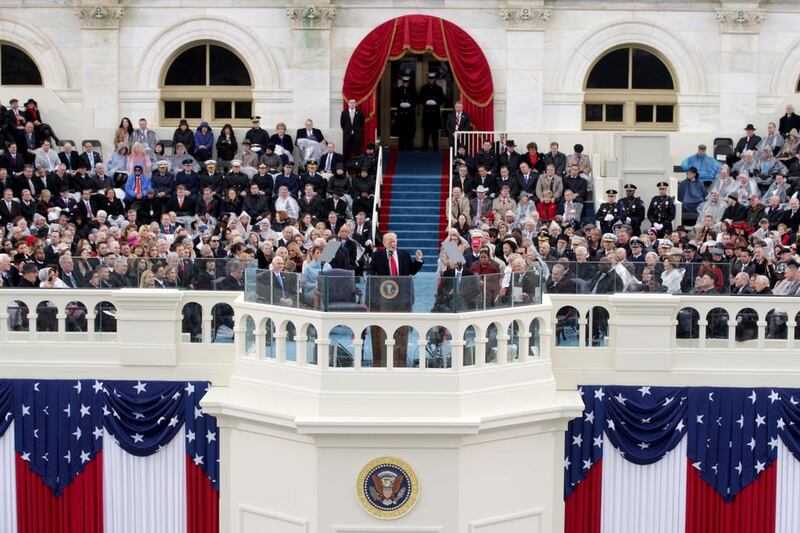 Donald Trump takes the oath of office as he is sworn in as the 45th president of the United States, in Washington, DC.  Alex Wong / Getty Images / AFP

