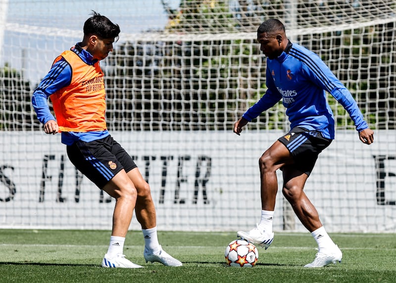 Real Madrid's David Alaba, right, and Marco Asensio at Valdebebas training ground in Madrid as they prepare to face Liverpool in the Champions League final. All photos by Getty