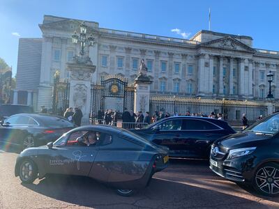 Cars drive to Buckingham Palace. Laura O'Callaghan / The National