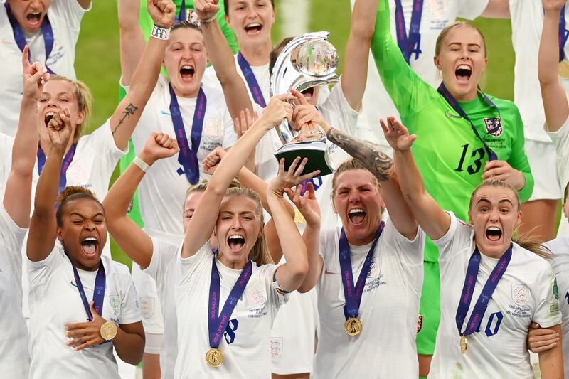 Leah Williamson of England lifts the Women’s Euro 2022 trophy. Getty
