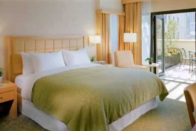 The rooms at California's first 'green hotel' feature fresh, simple decor, high-quality bed linen and eco-friendly toiletries. Courtesy Orchard Garden